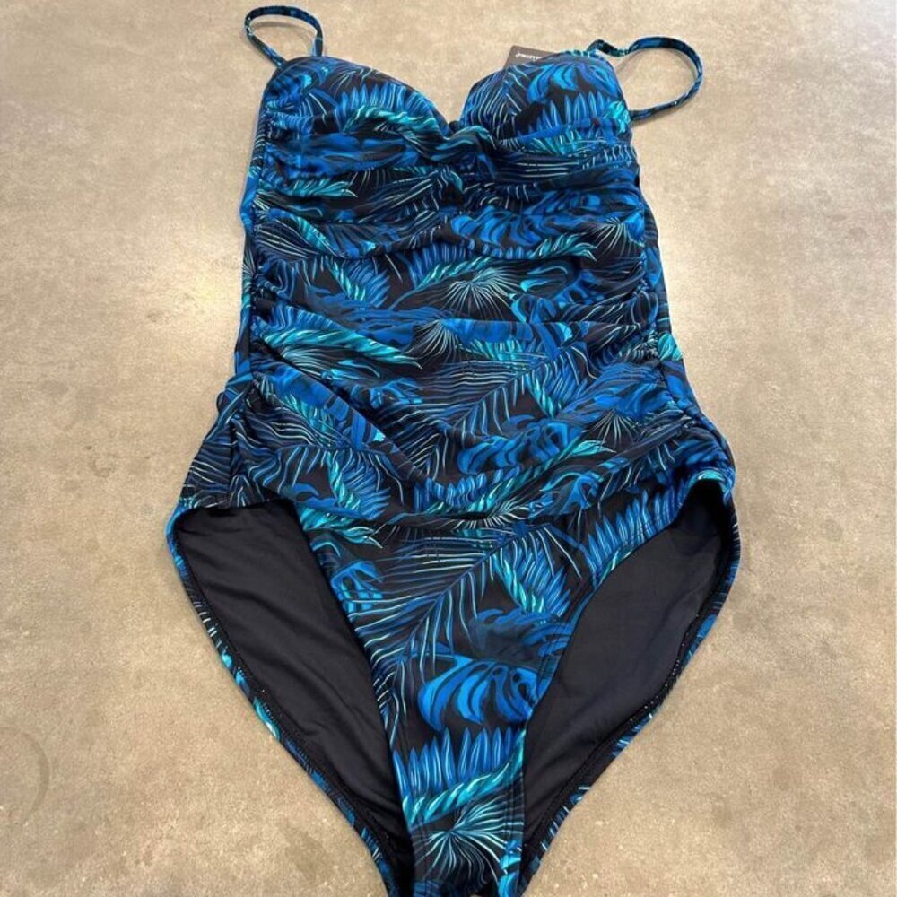Brand New with tags! Womans swimsuit. Rouching. Adjustable. Size Medium.